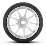 Silver multi-spoke alloy wheel with centered hub, mounted on a black tire