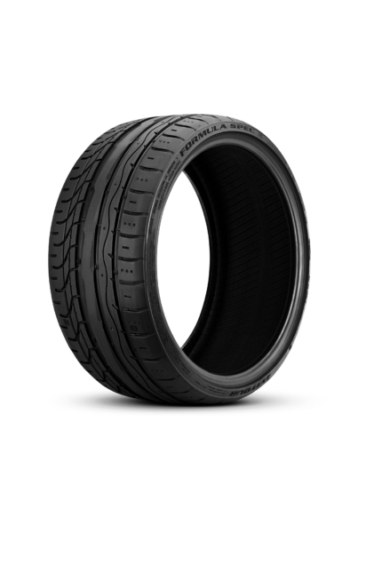 Close-up of a black tire with visible tread patterns and the sidewall text 'FORMULA SPEC'.